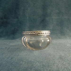 Glass trinket bowl/tealight holder with metal rim