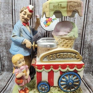 Waco Melody in Motion Ice Cream Vendor Bisque Porcelain Music Motion NIB