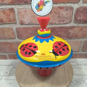 Vintage LBZ 6" Spinning Toy Top Tin Metal West Germany Lady Bug Red Handle
