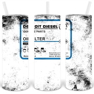 May include: A white stainless steel tumbler with a black and white distressed graphic of a Detroit Diesel oil filter label. The label includes the text "Detroit Diesel", "Gen. Parts", "Oil Filter", and "2353".