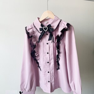 long sleeve pink jirai kei blouse ruffle with lace details buttoned and bow with heart bead, j-fashion, jfashion, japanese fashion, girly kei, dark girly, ryousangata, casual lolita, yami kawaii, cute gift idea for her girlfriend