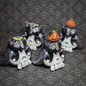Bat skulls flying into your heart, OOAK, plaster cast, polymer clay, acrylic paint.