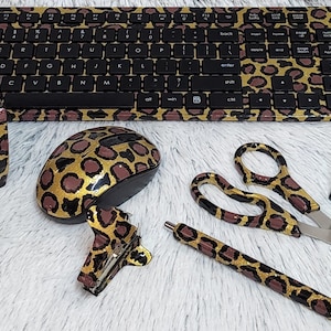 Complete leopard print resin desk set with keyboard option.