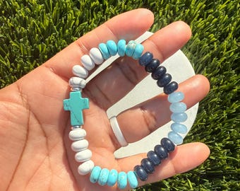 Pulsera con cruz turquesa