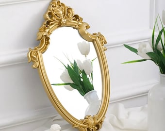 Miroir suspendu baroque doré vintage