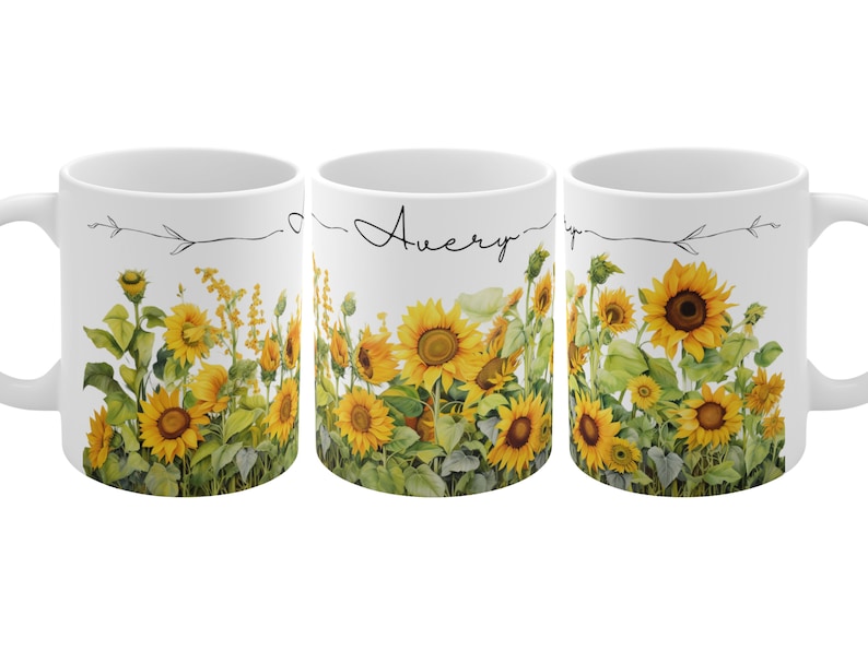 May include: White ceramic mug with a black and white sunflower design. The mug has the name "Avery" written on it.