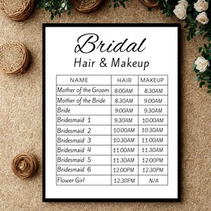 May include: A white rectangular sign with a black border featuring the text Bridal Hair & Makeup at the top. Below is a table with columns for Name, Hair, and Makeup, listing roles from Mother of the Groom to Flower Girl with scheduled times.