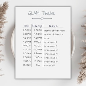 May include: A white rectangular card titled GLAM Timeline with a central heart icon. The card features a three-column table listing Hair and Makeup times from 8:00AM to 12:30PM alongside names including Mother of the Groom, Bride, and various Bridesmaids.