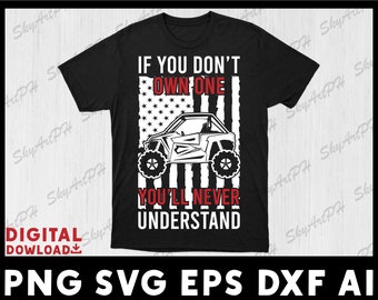 May include: Black t-shirt with a red, white, and blue American flag design. The text "If you don't own one you'll never understand" is printed on the shirt. A white silhouette of a side-by-side vehicle is in front of the flag.