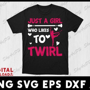 May include: Black t-shirt with a pink design that says "Just a girl who likes to twirl". The design includes a silhouette of a twirler with a baton.