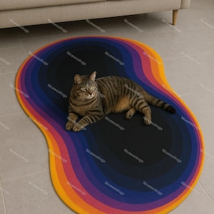 May include: A colorful, abstract rug with a layered design in shades of orange, yellow, purple, and blue. A brown tabby cat is lying on the black center of the rug. The rug is on a tiled floor.