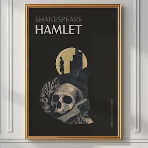 May include: A framed art print featuring the text "SHAKESPEARE HAMLET" in white against a black background. The artwork includes a skull, silhouette of a person, and a castle, with a gold frame.