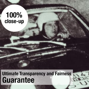 May include: Monochrome vintage photograph of a person in a helmet driving a car. The image includes the text "100% close-up" in a white circle and the text "Ultimate Transparency and Fairness Guarantee".