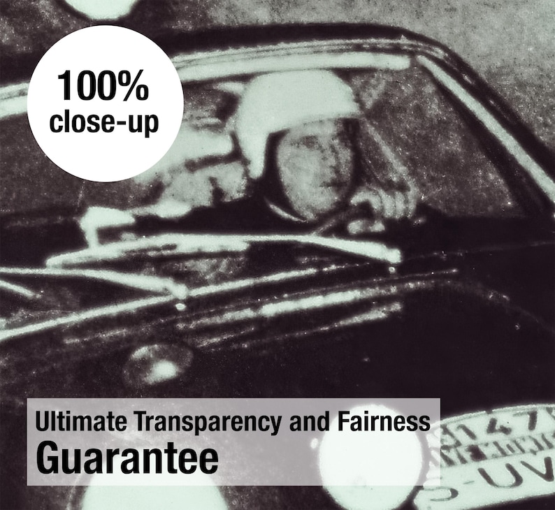 May include: Monochrome vintage photograph of a person in a helmet driving a car. The image includes the text "100% close-up" in a white circle and the text "Ultimate Transparency and Fairness Guarantee".