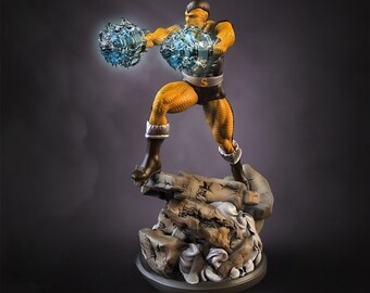 May include: A yellow and black action figure of a superhero with a blue and white energy effect in each hand. The figure is standing on a rocky base.