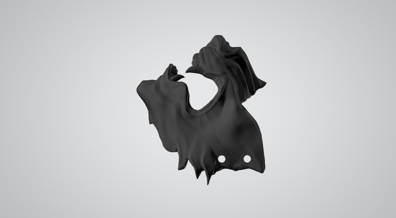 May include: A black fabric mask with a jagged edge and two holes. The mask is designed to cover the nose and mouth.