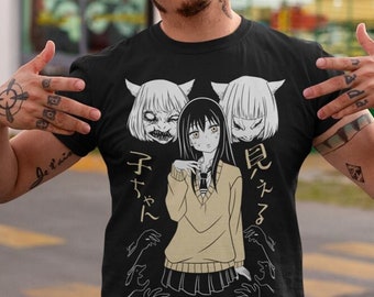 May include: Black t-shirt with a graphic print of three anime characters. The characters are a girl with black hair and two girls with white hair and horns. The text on the shirt reads "見イタイ" and "チヤント".