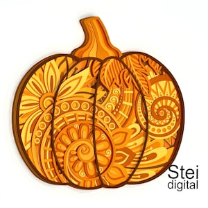 May include: A layered, decorative pumpkin in shades of orange and brown, featuring intricate floral and geometric patterns. The pumpkin has a stem and is set against a white background. The text "Stei digital" is in the bottom right corner.
