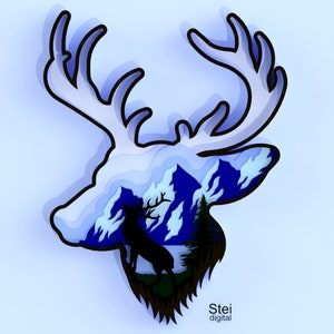 May include: A layered paper art piece in the shape of a deer head, featuring a mountain and forest scene within. The artwork uses shades of blue and white, with black outlines. The text "Stei digital" is in the bottom right corner.