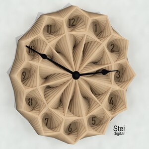 May include: A beige wooden clock with a geometric design. The clock face has black hands and black numbers. The clock is made of layered wood and has a 3D effect. The clock is labeled "Stei digital" at the bottom.