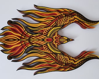 May include: A layered paper art piece depicting a phoenix with intricate details. The phoenix is made of red, orange, and yellow paper and has a black outline. The wings are spread wide and the bird is in flight.