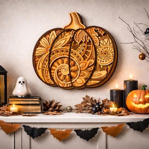 May include: A wooden pumpkin wall hanging with intricate designs is the focal point of a Halloween display. A carved jack-o'-lantern, candles, and a ghost figurine are also present. A garland of bats and leaves decorates the mantel.