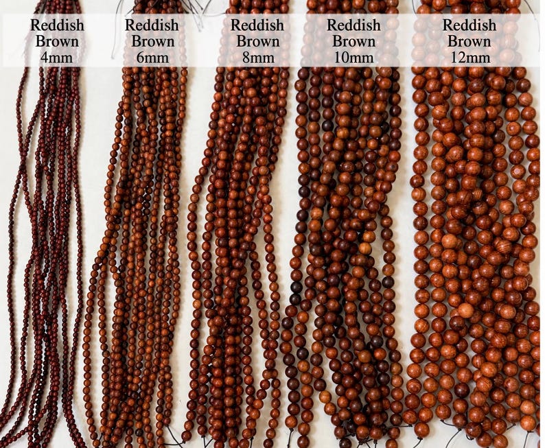 May include: Five strands of reddish brown beads arranged vertically, labeled by size as 4mm, 6mm, 8mm, 10mm, and 12mm. Each strand consists of numerous spherical beads strung together, showing a consistent color gradient across all five variations.
