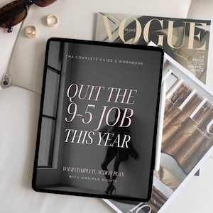 May include: A black and white digital tablet with a pink and white text overlay that reads "Quit the 9-5 Job This Year: Your Complete Action Plan with MER/PLR Rights". The tablet is on a white surface with a magazine on top of it.