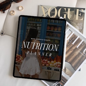 May include: A digital tablet displaying a nutrition planner with the text "WITH MRR/PLR RIGHTS NUTRITION PLANNER" on a white background. The tablet is surrounded by magazines.