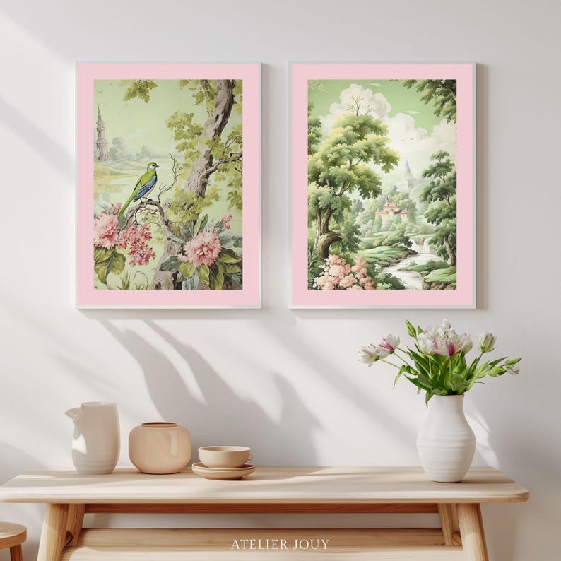 This bird printable art pairs a botanical close-up with a sweeping landscape. In the first print, a green bird with a blue head rests on a branch above clusters of pink peonies. The companion print opens onto a soft chinoiserie garden scene with ancient trees, a river and a pavilion among the blossoms. All standard ratios included. Instant digital download.