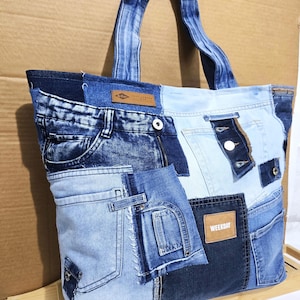 Cabas Levi's multi-poches en patchwork retravaillé - Sac à main bohème upcyclé pour voyageur - Sac de plage en denim à bandoulière