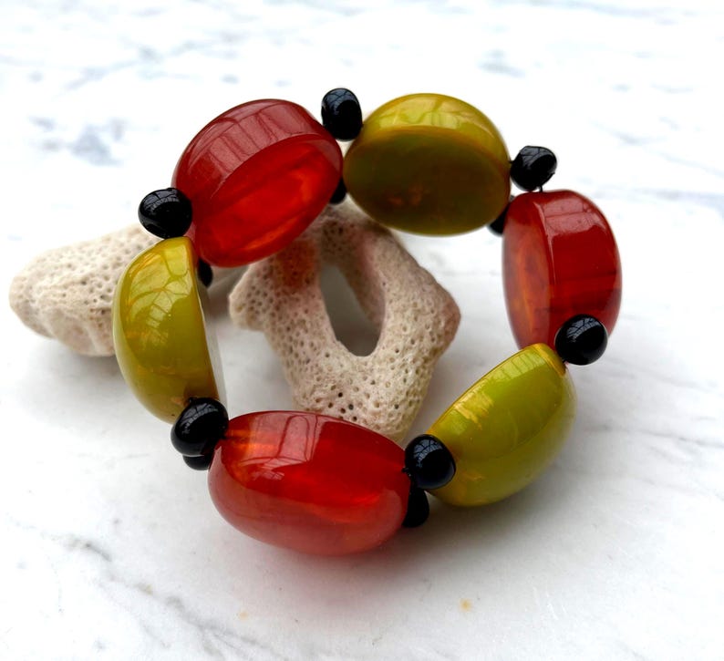 old resin bracelet (Galalithe) on piece of white coral (without corao!)