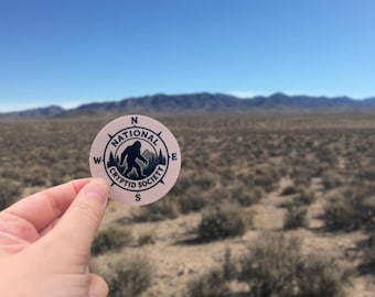 National Cryptid Society Badge Sticker Glossy Vinyl Waterproof Bigfoot Compass Design for Laptops Water Bottles Notebooks and Gifts