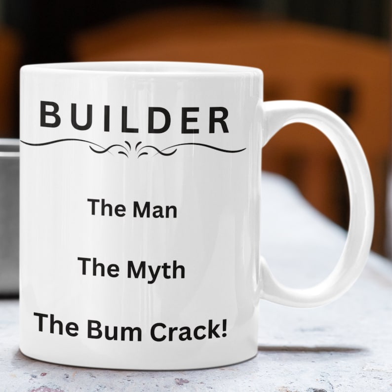 A white ceramic 11oz coffee mug for Builders with the funny caption, The Man, The Myth, The Bum Crack