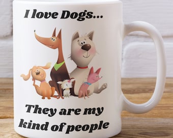 May include: White ceramic coffee mug with a cartoon image of four dogs. The mug has the text "I love Dogs... They are my kind of people" printed on it.