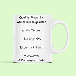 May include: White ceramic mug with black text that reads "Quality Mugs By Malcolm's Mug Shop", "White Ceramic", "11oz Capacity", "Expertly Printed", "Microwave & Dishwasher Safe".