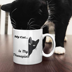 Funny Cat Mug | “My Cat Is My Therapist” Printed On 11oz Ceramic Mug With Comical Cat Looking Around The Door, Cat Lover Mug, Cat Mum Mug.