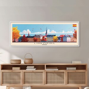 May include: A colorful illustration of a cityscape with buildings in shades of yellow, orange, red, and pink. The city is called "Linköping, Sweden".