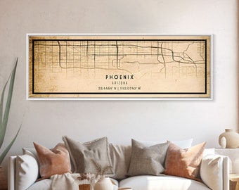 May include: A vintage-style map print of Phoenix, Arizona. The map is in black and white and shows the city's streets and landmarks. The text "PHOENIX ARIZONA 33.4484° N | 112.0740° W" is printed at the bottom of the map.