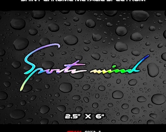 May include: A shiny chrome metallic spectrum car sticker decal. The sticker reads "Sports Mind" in a colorful gradient. The sticker measures 2.5" x 6" and is on a black background with water droplets.