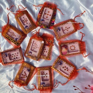 Wholesale Bindi Gift Packs - Festive Orange Organza Bags,Forehead Jewels,Karwa Chauth, Navratri (Garba nights), Raksha Bandhan,Teej Gift