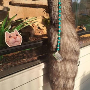 handmade tail charm!