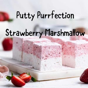 May include: Strawberry marshmallows with a pink and white layered design, dusted with powdered sugar. The image includes the text "Putty Purrfection Strawberry Marshmallow" and fresh strawberries.