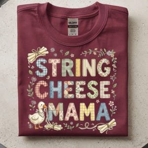 May include: A set of three ceramic mugs with a speckled, cream-colored glaze. Each mug features a different hand-painted floral design in shades of blue, green, and yellow. The mugs have a simple, rounded shape and a comfortable handle.