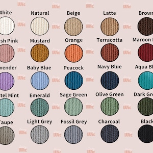 May include: A color chart featuring 28 yarn colors, each displayed in a circular swatch. Colors include white, beige, pink, orange, and various shades of blue, green, and brown. The text labels each color.