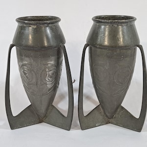 Pair of Liberty & Co.  Art Nouveau Tudric bomb vases