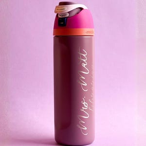 Freesip Sway 32 oz Custom Jug, Laser Engraved Owala with Birth Flower. Insulated Bottle, Your Logo Custom. Christmas gift, Teacher Gift, Bridesmaid Proposal essential.
Engraved Owala Bottle, 24oz Tumbler Dish with Personalized 3d Plate Owala style. Floral Tumbler, Stainless Steel. Christmas gift for Cheer Team, Custom Name Gift.