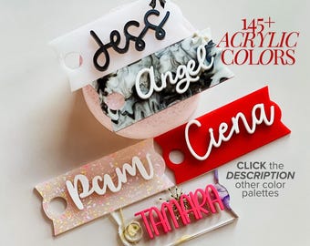May include: Five rectangular acrylic name tags with rounded notched sides and a circular hole on the left. Names include Jess, Angel, Ciena, Pam, and TAMARA in various fonts and colors. Text reads 145+ ACRYLIC COLORS and CLICK the DESCRIPTION other color palettes.