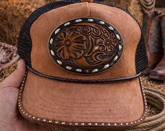 Western Inspired Suede snapback trucker hat featuring an authentic, tooled leather buckle and embellishments