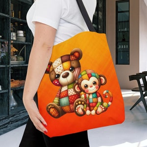 May include: A bright orange tote bag with a patchwork bear and monkey design. The bear and monkey are both smiling and have colorful patchwork patterns.
